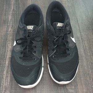 Black Nike Flex Run sneakers.